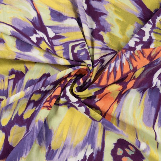 Tissu Jersey Viscose imprimé Butterfly tie and dye sur fond Lilas
