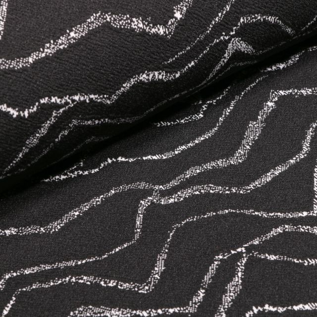 Tissu Jacquard polyviscose extensible Motifs abstraits blanc sur fond Noir