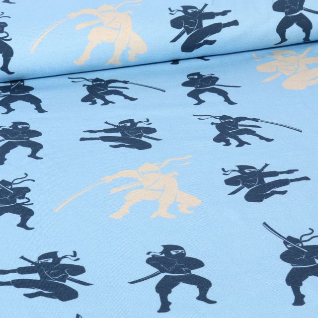 Tissu Jersey Coton Ninja sur fond Bleu