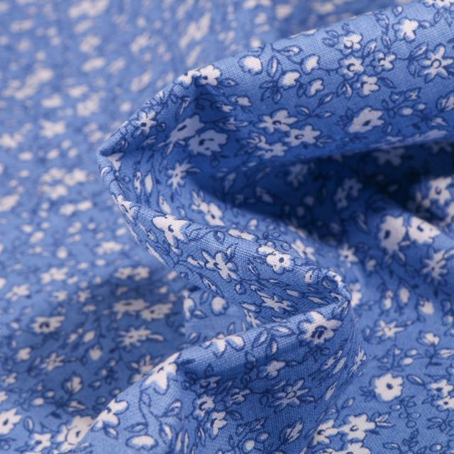 Tissu Coton imprimé Arty Léonie blanc sur fond Bleu - Par 10 cm