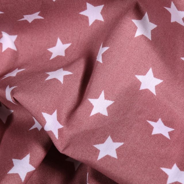 Tissu Coton imprimé Grandes étoiles blanches sur fond Vieux rose - Par 10 cm