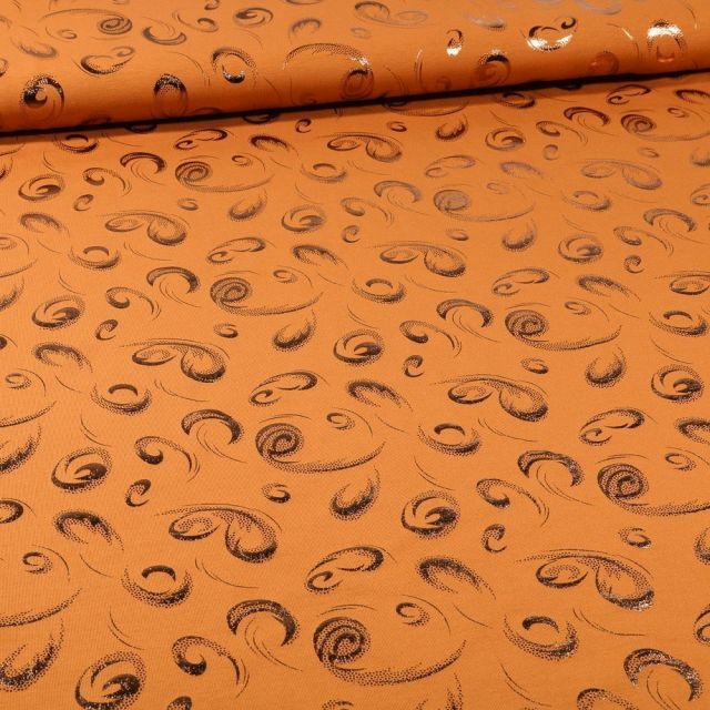 Tissu Jersey Coton Spirale métallisée sur fond Ocre - Par 10 cm
