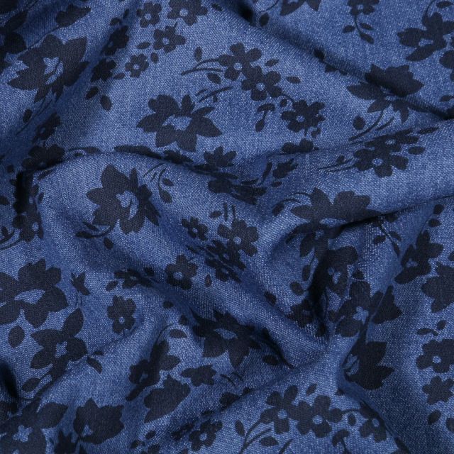 Tissu Jean élasthanne Fleurs noires sur fond Bleu - Par 10 cm