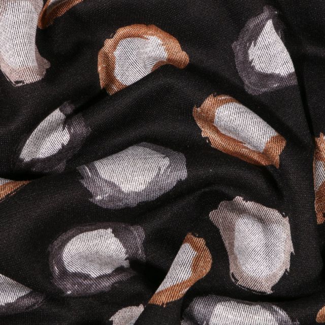 Tissu Jersey Milano Pois destructurés bicolores sur fond Noir - Par 10 cm