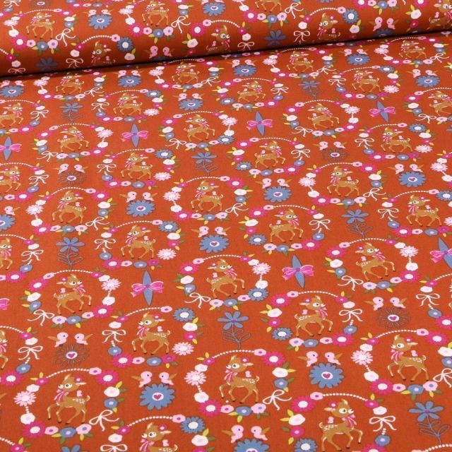 Tissu Coton imprimé Faons et couronnes de fleurs sur fond Brique - Par 10 cm