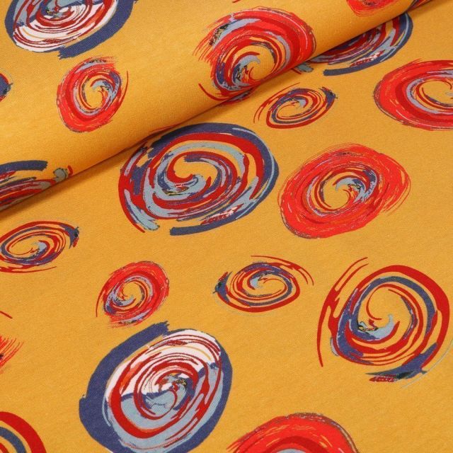 Tissu Jersey Coton Spirales colorées sur fond Jaune - Par 10 cm