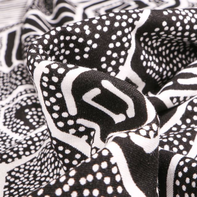 Tissu Jersey Viscose  Motifs abstraits pointillés sur fond Noir