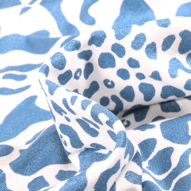 Tissu Jersey Viscose avec aspect crêpe Taches léopard sur fond Bleu