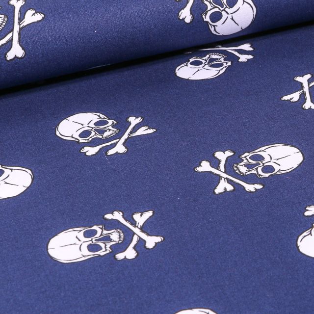 Tissu Coton imprimé Têtes de morts sur fond Bleu marine
