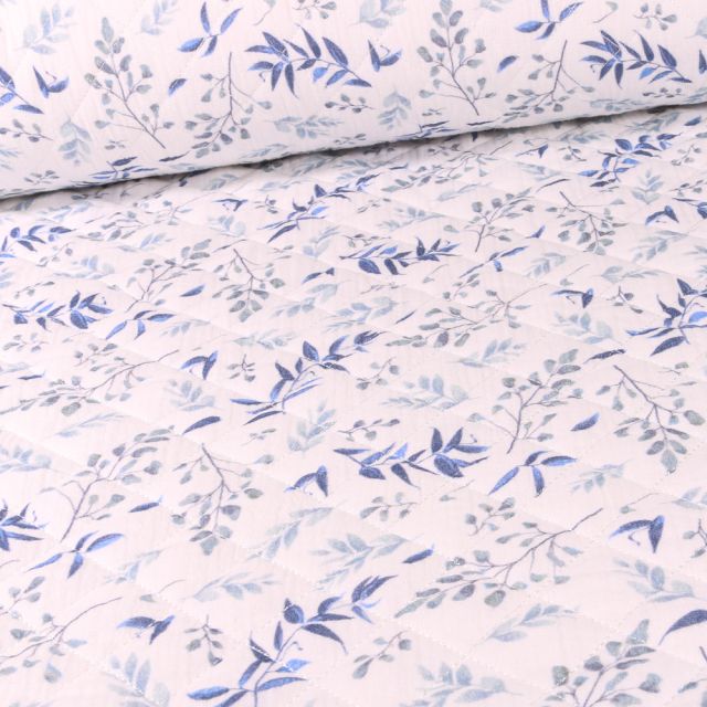 Tissu Double gaze Matelassée Branches fleuries bleu sur fond Blanc