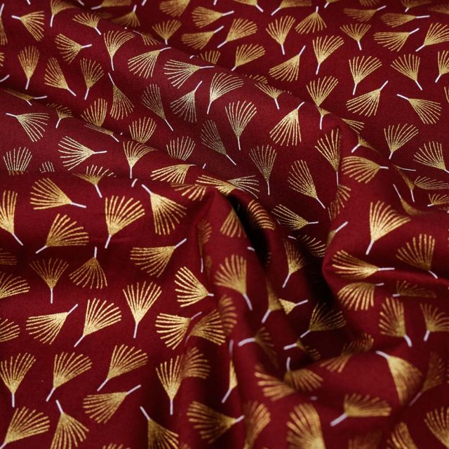 Tissu Coton imprimé Fleurs dorés sur fond Rouge foncé