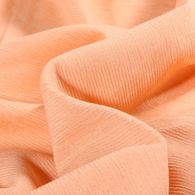 Tissu Viscose uni Rayures texturées sur fond Saumon