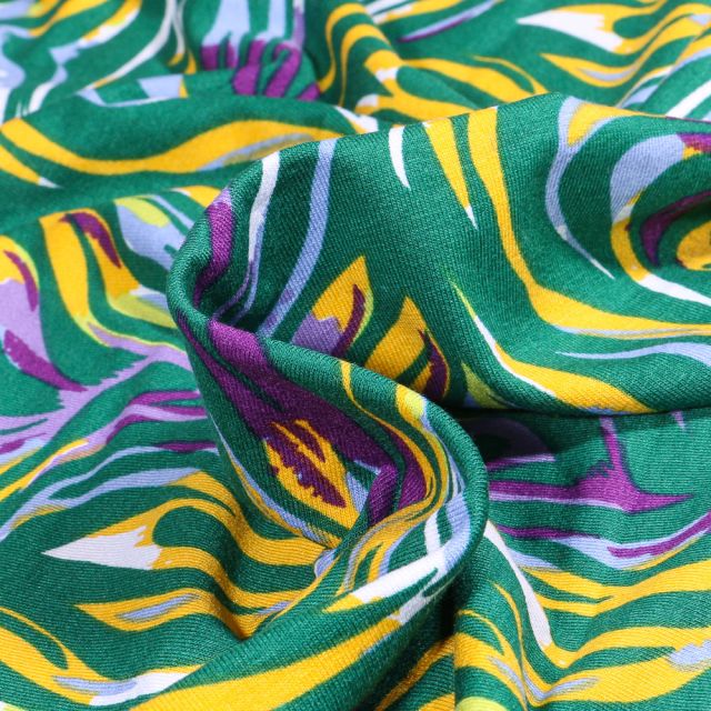 Tissu Jersey Viscose  Lignes abstraites colorées sur fond Vert
