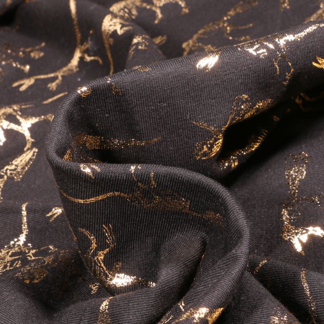 Tissu Jersey Coton Squelettes Dino métallisé sur fond Noir