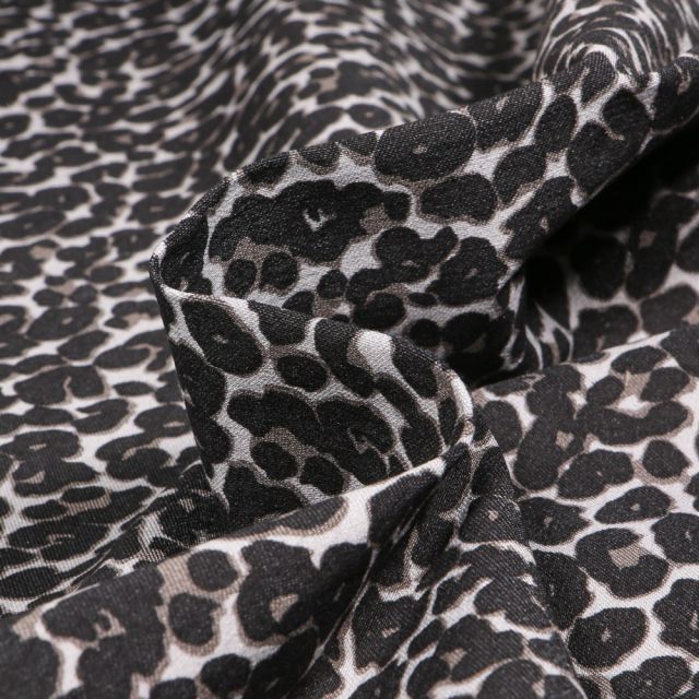 Tissu Bengaline Cheetah noir sur fond Blanc