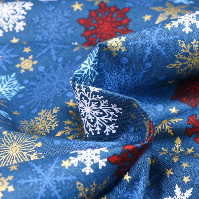 Tissu Coton imprimé Christmas flocon sur fond Bleu