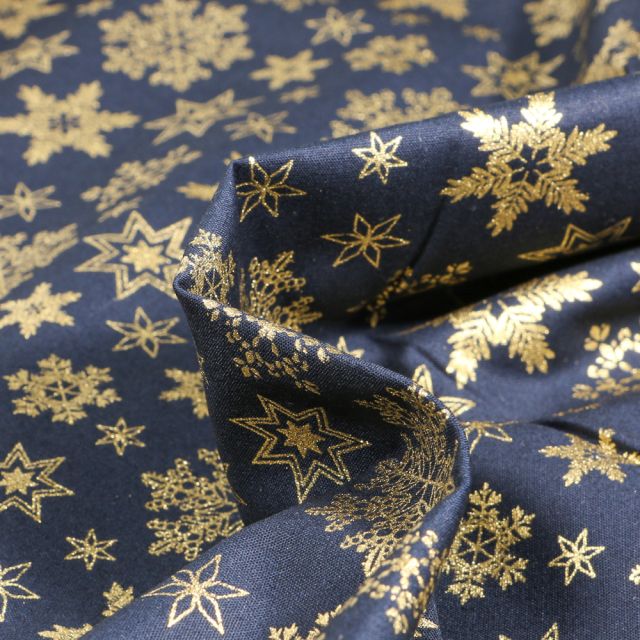 Tissu Coton imprimé Flocons des neiges dorés sur fond Bleu marine