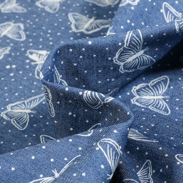 Tissu Chambray stretch Papillons et petits pois sur fond Bleu