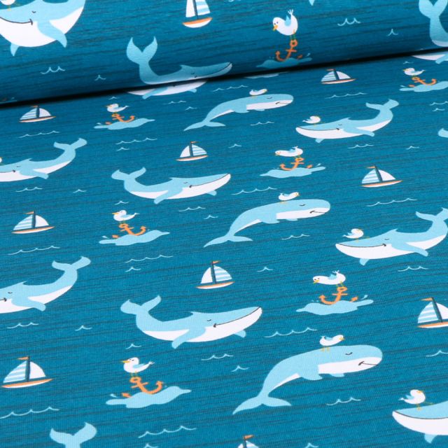 Tissu Jersey Coton Happy Baleines sur fond Bleu pétrole
