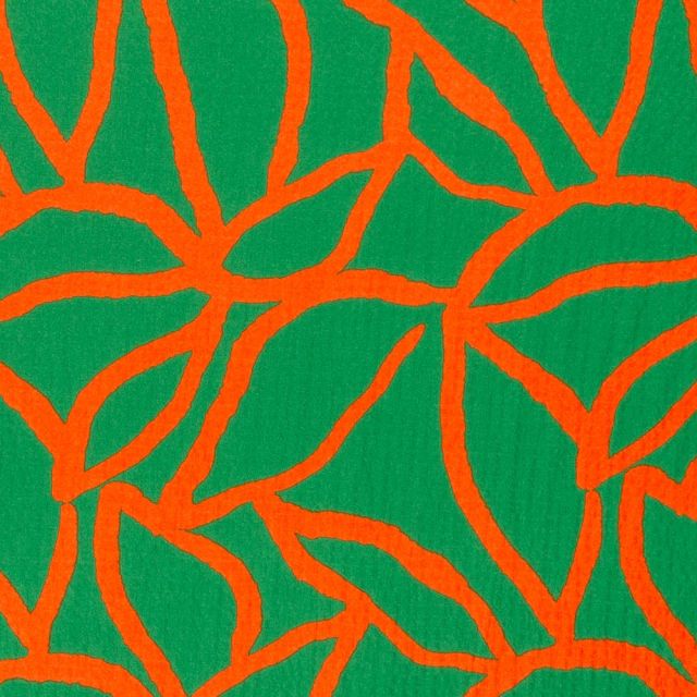 Tissu Viscose gaufré Feuillage orange sur fond Vert