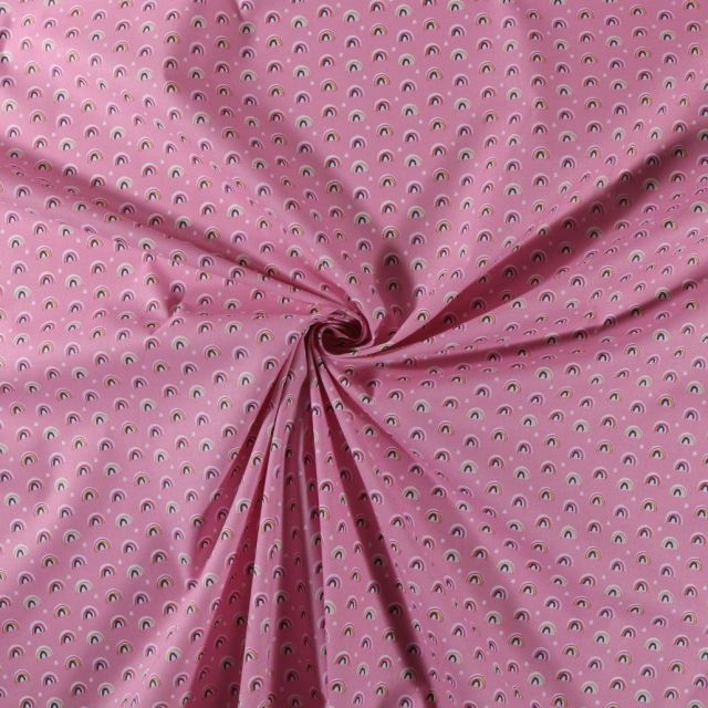 Tissu Coton imprimé Arcs en ciel multicolore sur fond Rose - Par 10 cm