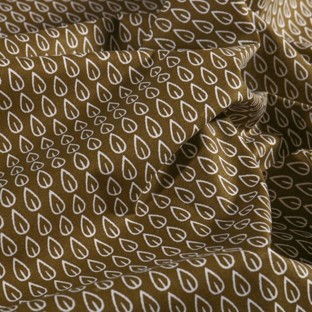 Tissu Coton imprimé Arty Feuilles blanches sur fond Marron - Par 10 cm
