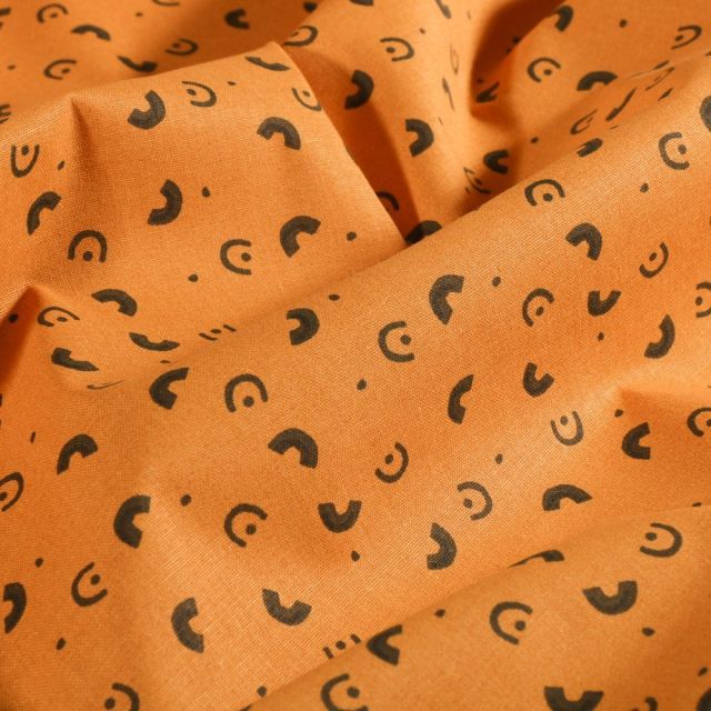 Tissu Coton imprimé Arty Demi-cercle noir sur fond Ocre - Par 10 cm