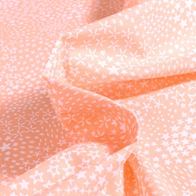 Tissu Coton imprimé Arty Anggun sur fond Pêche
