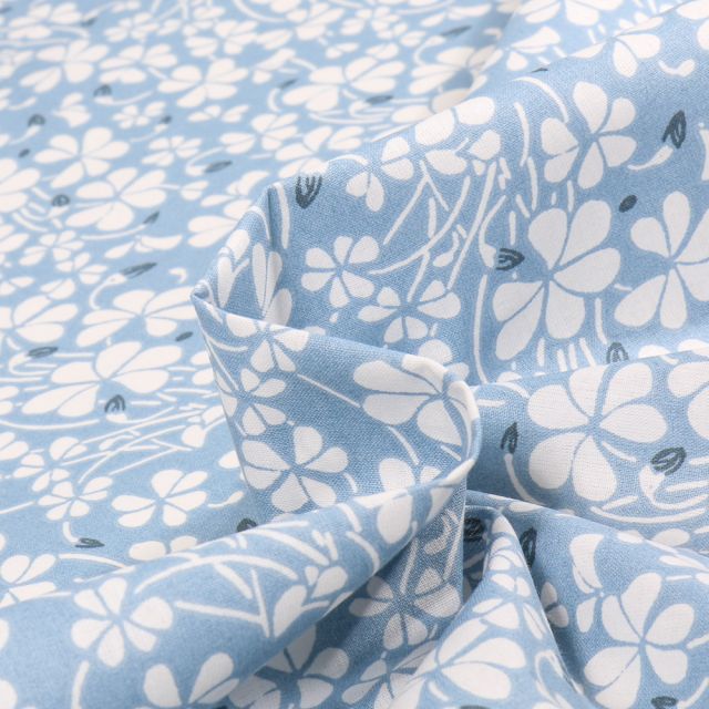 Tissu Coton imprimé Arty Oxalia sur fond Bleu ciel