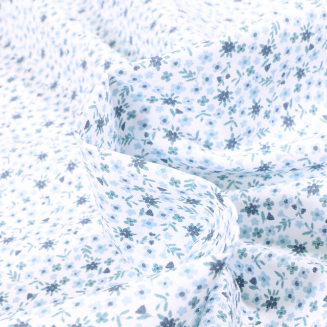 Tissu Coton imprimé Arty Pio bleu sur fond Blanc
