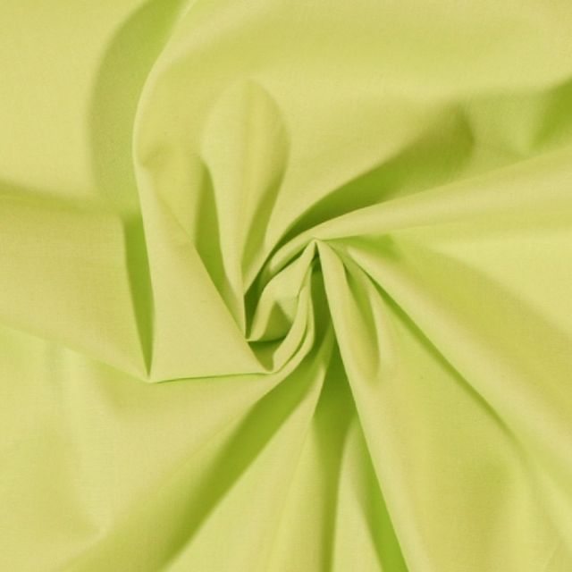 Tissu Coton uni Vert anis - Par 10 cm