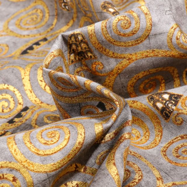 Tissu Gustav Klimt Arbres en volutes dorées sur fond Gris