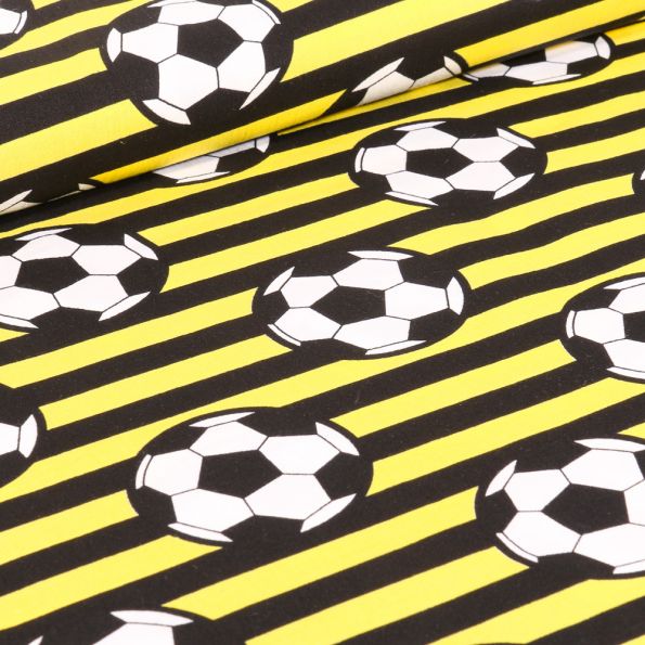 Tissu Coton imprimé Ballons de foot et rayures noires sur fond Jaune - Par  10 cm