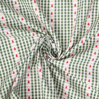 Tissu Coton imprimé Arty St Gervais petits carreaux et sapins sur fond Vert - Par 10 cm