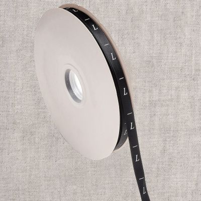 Ruban étiquettes 10 mm Taille L sur fond Noir