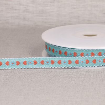 Ruban imprimé 15 mm coeurs sur fond Bleu clair x1m