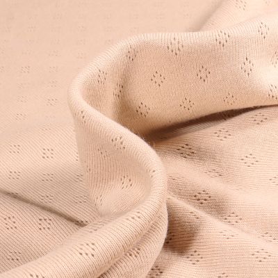 Tissu Jersey Coton ajouré uni Beige clair - Par 10 cm