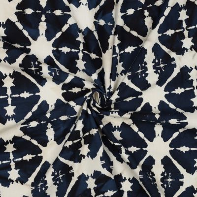 Tissu Batik de Coton étoilés sur fond Bleu nuit - Par 10 cm