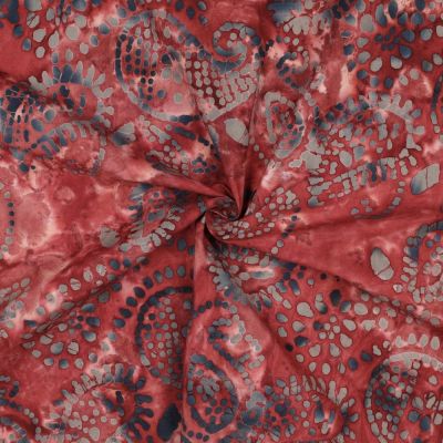 Tissu Batik de Coton rosaces et spirales Gris bleuté sur fond Rouge tomette - Par 10 cm