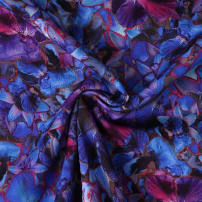 Tissu Viscose stretch Bloom Nocturne fleurs Violettes sur fond Bleu roi - Par 10 cm