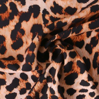 Tissu Viscose  motif léopard Kivora sur fond Beige sable - Par 10 cm