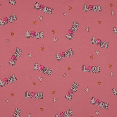 Tissu Jersey Coton Love sur fond Vieux rose - Par 10 cm