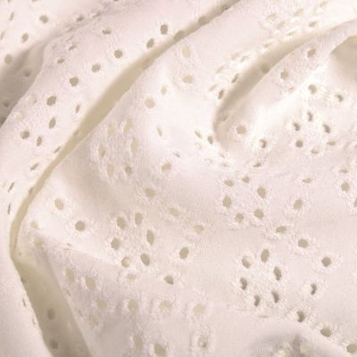 Tissu Jersey Fleurs ajourées Uni Blanc cassé - Par 10 cm