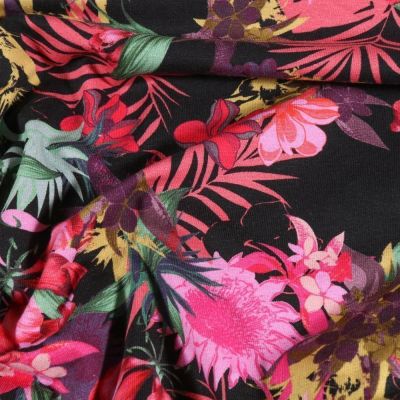 Tissu Jersey coton Fleurs et feuilles de palmier sur fond Noir - Par 10 cm
