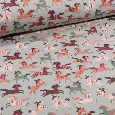 Tissu Jersey Coton Chevaux indiens sur fond Vert pâle - Par 10 cm