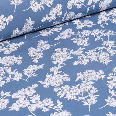 Tissu Coton imprimé Branches fleuries sur fond Bleu - Par 10 cm