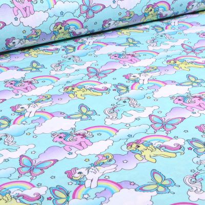 Tissu Coton imprimé sous licence My little Pony sur fond Bleu turquoise - Par 10 cm