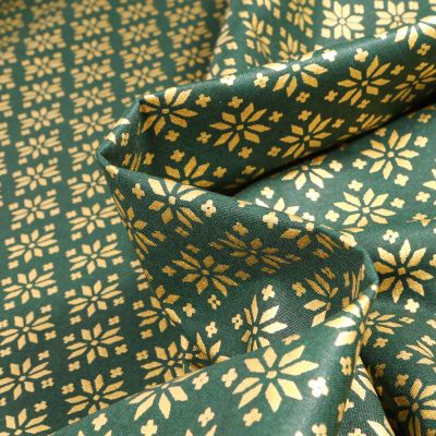 Tissu Coton imprimé Bio Beaux flocons dorés sur fond Vert foncé - Par 10 cm