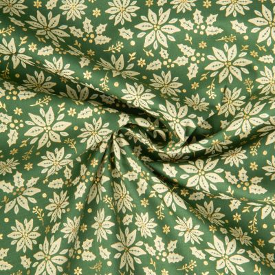 Tissu Coton imprimé fleurs dorées de noël sur fond Vert - Par 10 cm