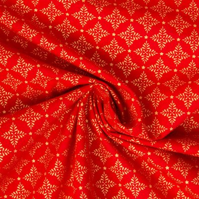 Tissu Coton imprimé flocons dorés de noël sur fond Rouge - Par 10 cm